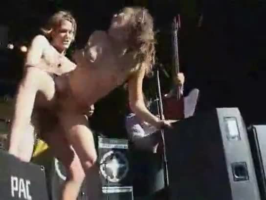 Hot blonde masturbation in a rock concert